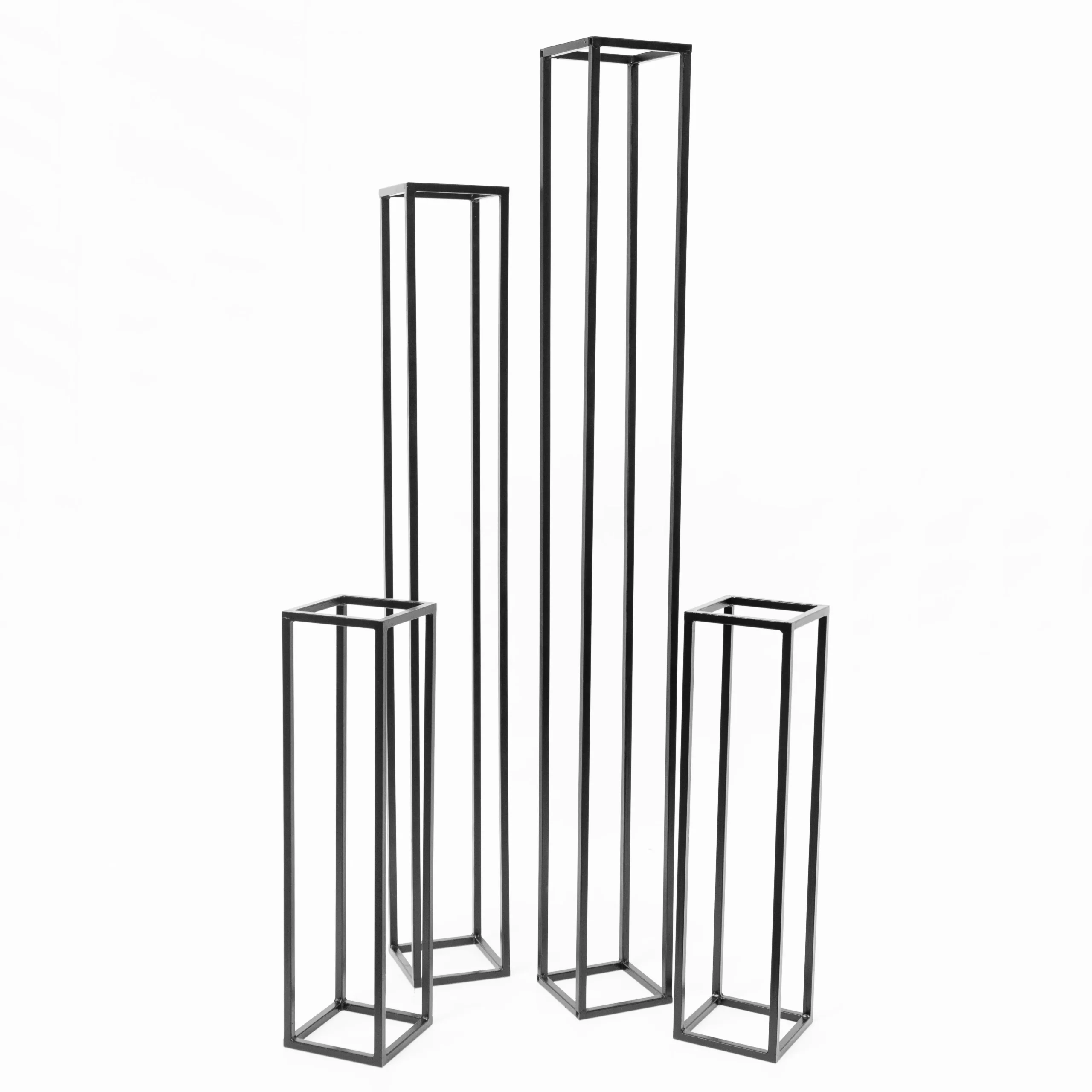 czarne slupki stalowe na dekoracje rozne wysokosci wesela eventy wypozyczalnia dekoracji rent4events wroclaw scaled - Wypożyczalnia Ślubna Czarne słupki o różnych wysokościach to konstrukcyjne rozwiązanie dekoracyjne, idealne na dekoracje i do scenografii na ślub, wesele lub event we Wrocławiu i okolicach. Geometryczne formy w minimalistycznym stylu doskonale sprawdzają się jako podstawy do kwiatów, tkanin lub innych elementów scenografii. Dzięki różnorodnym wymiarom zestaw umożliwia tworzenie dynamicznych aranżacji, które dodają przestrzeni elegancji i nowoczesności. Produkt dostępny w wypożyczalni Rent4Events.pl oraz Rent4Weddings.pl, oferującej wysokiej jakości wyposażenie eventowe - rent4events.pl wypożycz wrażenia, rent4wedding.pl zachowaj wspomnienia.